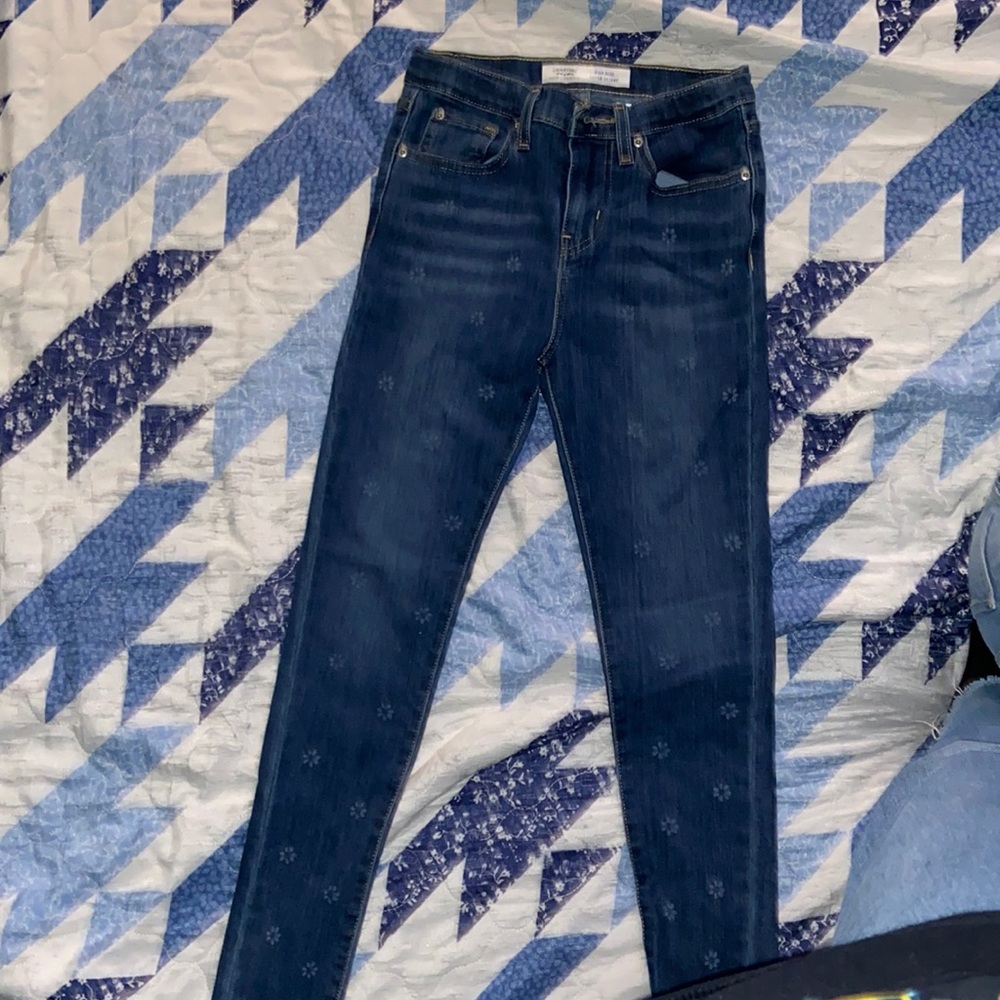 Blue jeans with flowers